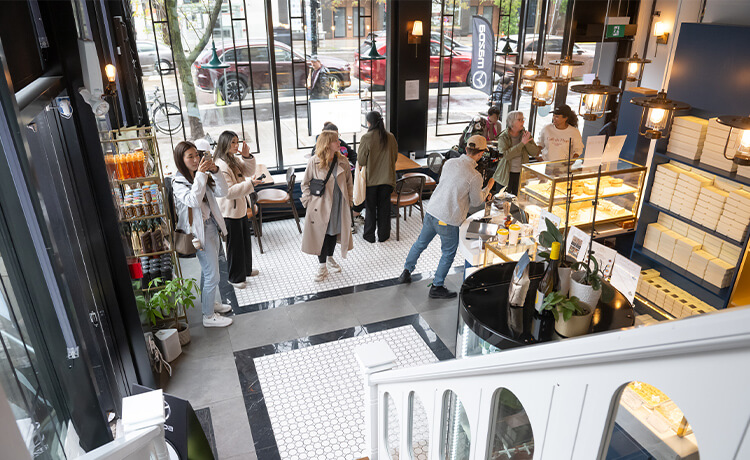 Overhead view of people taking photos in Liu Loqum Atelier.