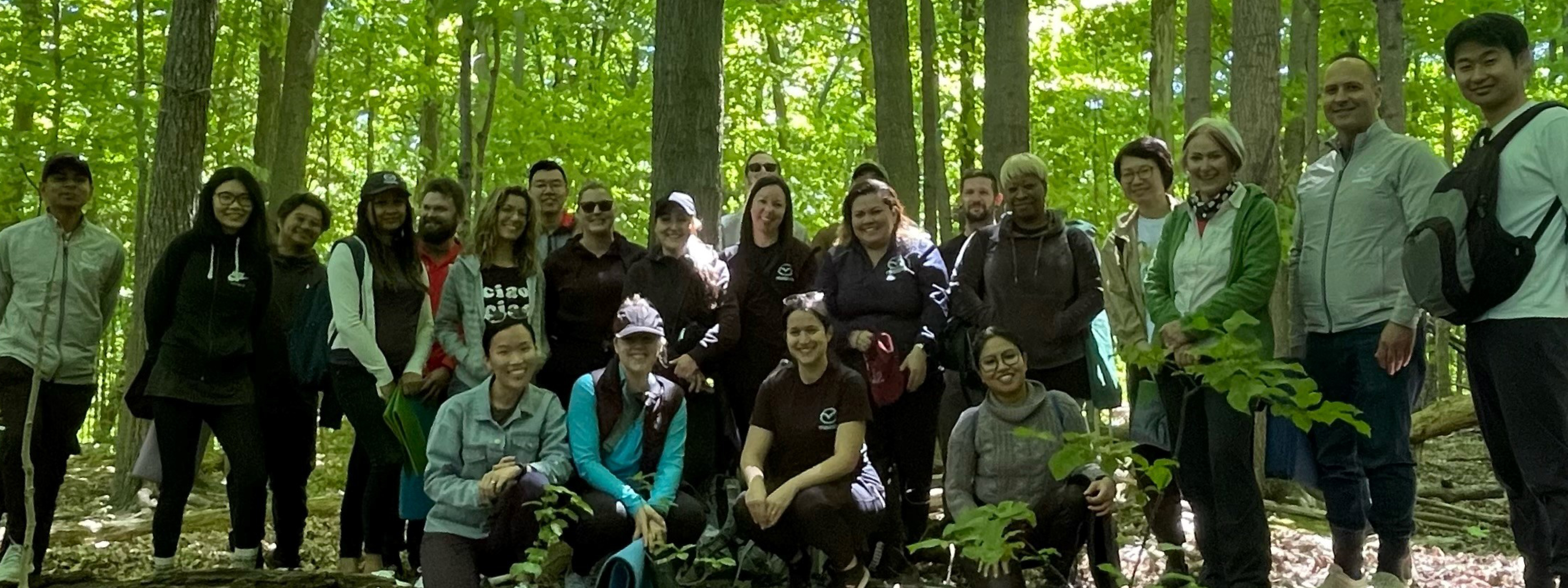 Family in a Mazda with quote from Mazda President 