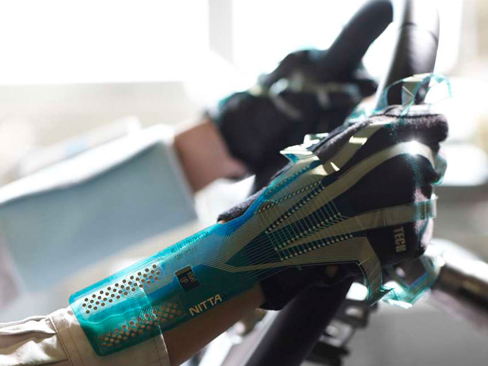 Gloved hands on steering wheel