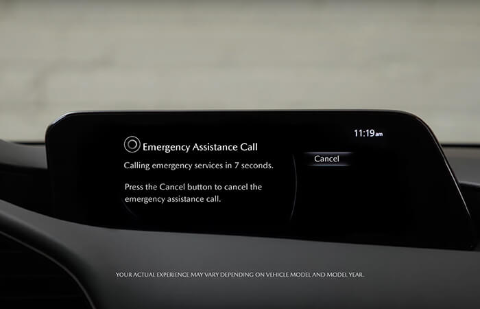 Full colour infotainment display shows Emergency Assistance Call onscreen.  