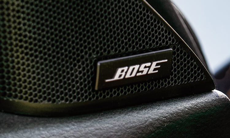 Close up of Bose speaker inside vehicle. 