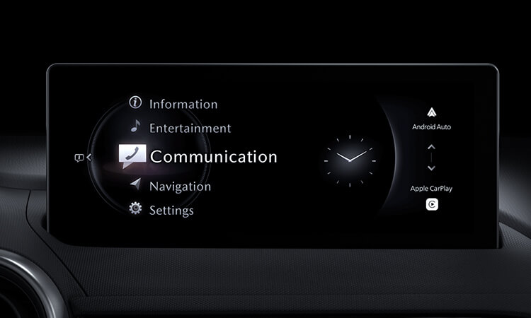 Close-up view of the HMI Commander switch interface in the dashboard of the MX-5 ST.