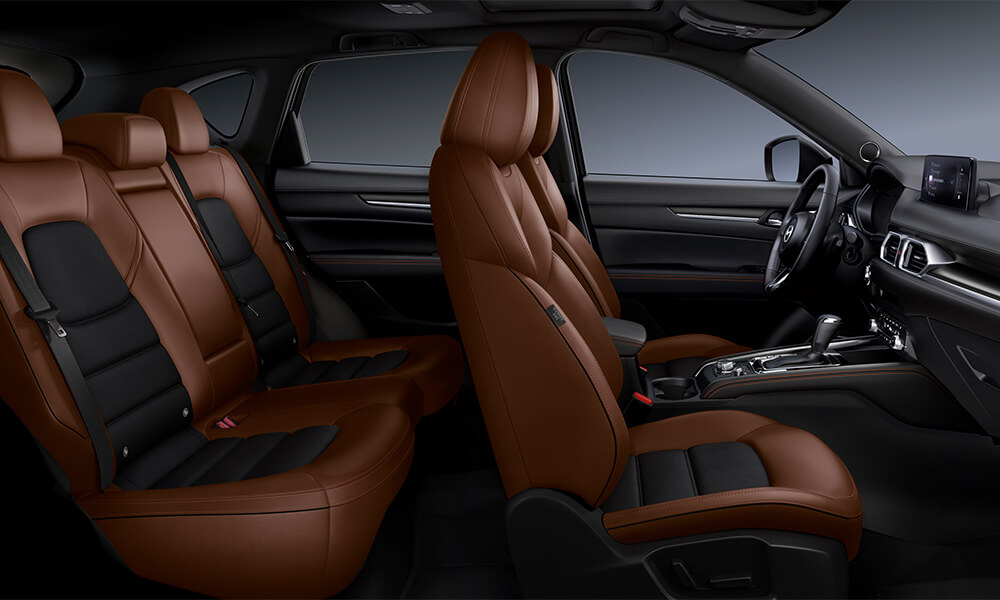 Side profile of interior of Mazda CX-5 passenger’s side view.
