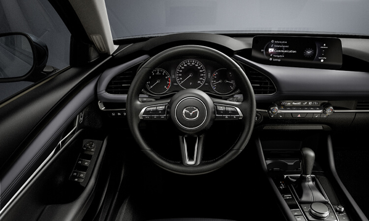 Driver’s side view inside Mazda3 Sport cockpit. 