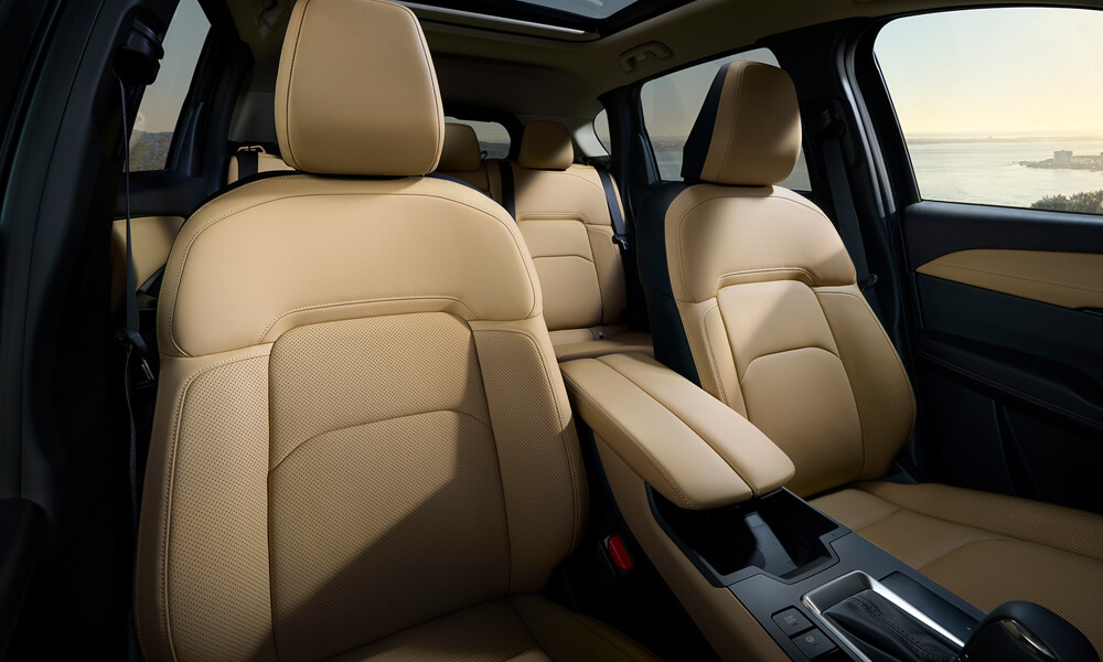 Looking into the Mazda CX-5 from the front passenger side, showing the front seats.